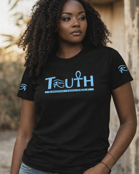 Woman wearing a black t-shirt with 'TRUTH' and a logo, standing outdoors.
