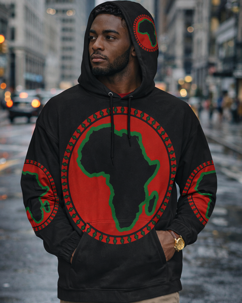 Person wearing a hoodie with an African continent design in a city setting