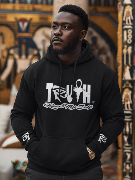 Man wearing a black hoodie with 'TRUTH is know thy Self' text in front of an Egyptian-style mural.