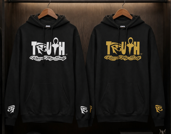 Two black hoodies with 'TRUTH' branding on hangers in a store setting.
